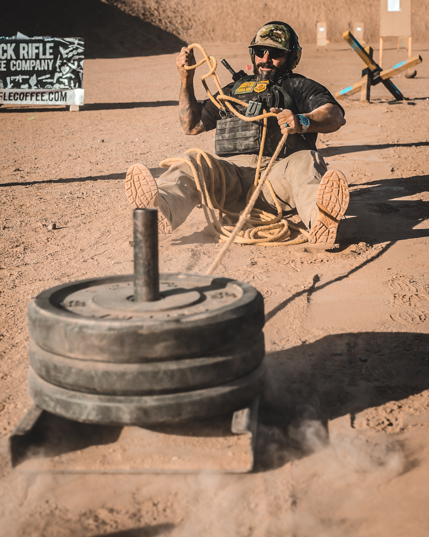 Tactical athlete pulling a weighted sled